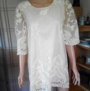 Stunning intricately embellished cream colored top